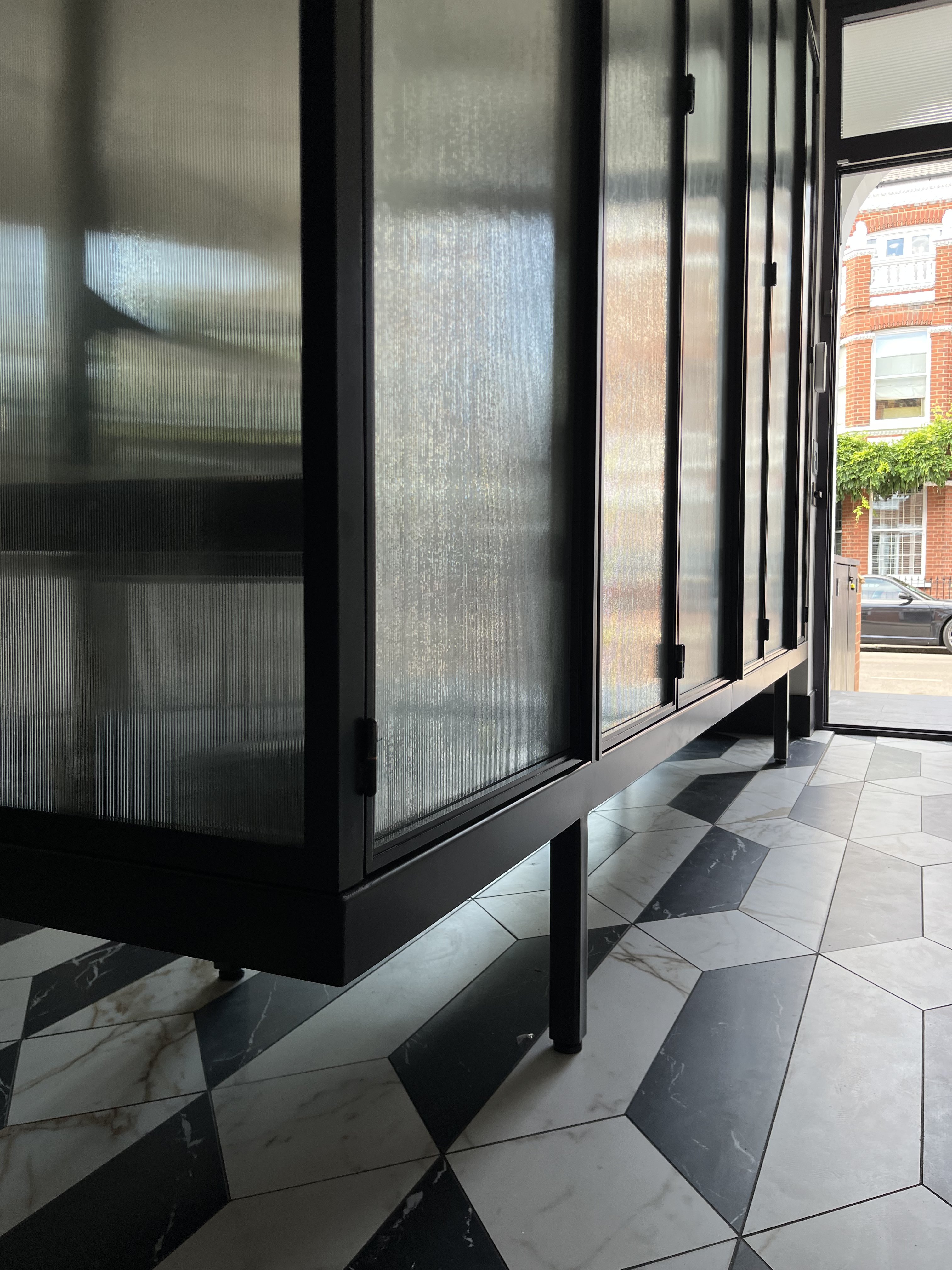 Steel-framed glass wardrobe with integrated lighting - finished photograph 6