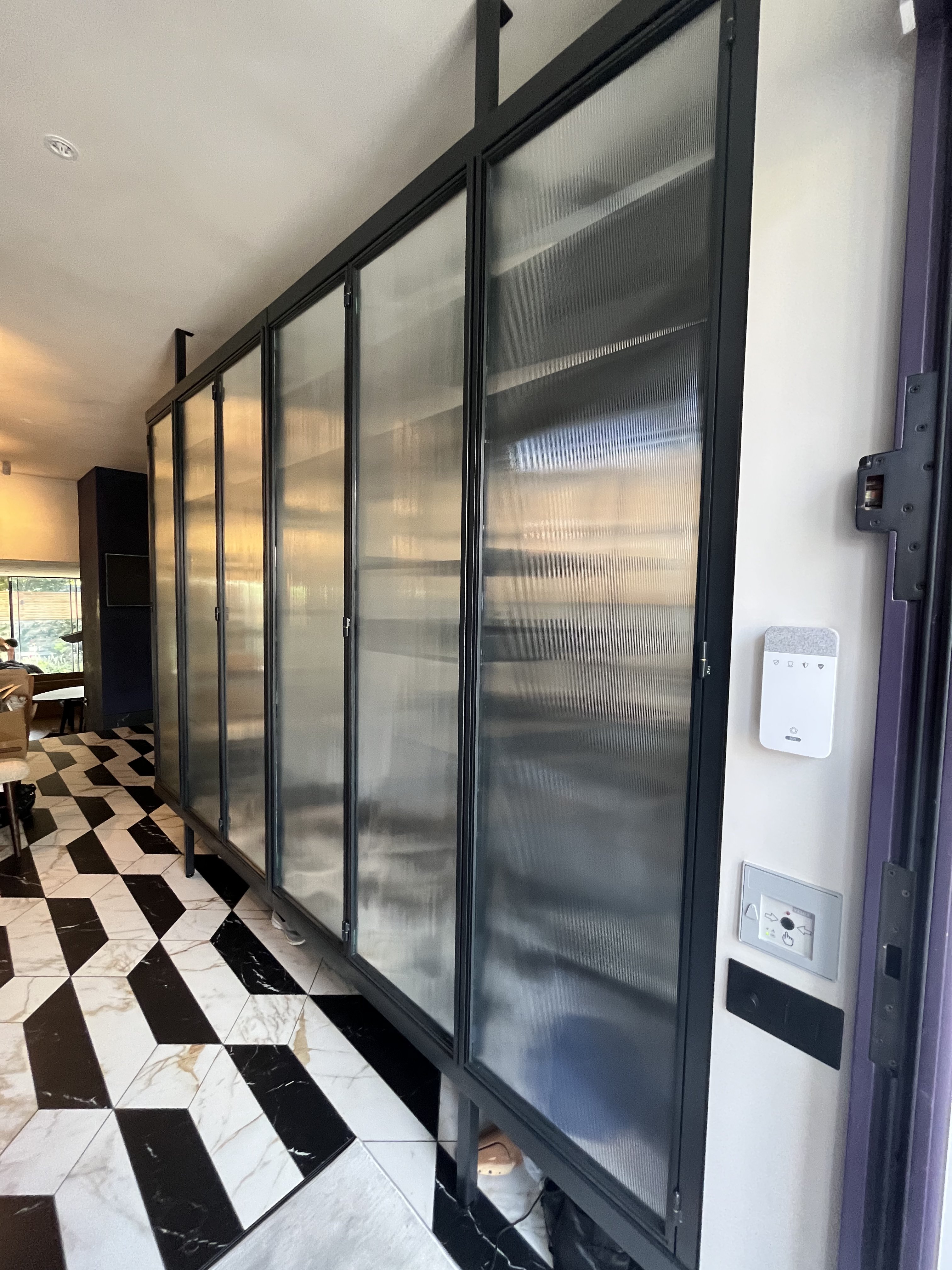 Steel-framed glass wardrobe with integrated lighting - finished photograph 10