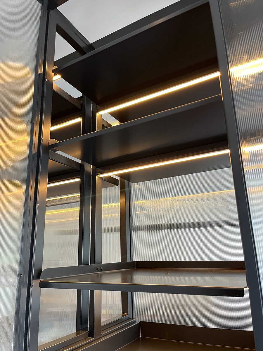 Lit shelves inside the wardrobe